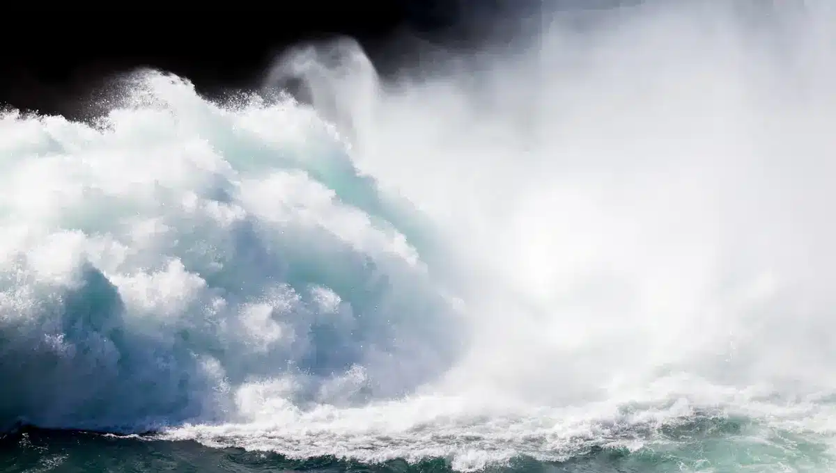 Massive ocean wave crashing with white spray reflecting emotional intensity in trauma therapy annapolis