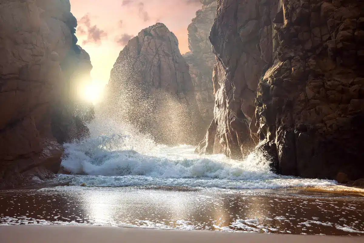 Waves crashing between sunlit cliffs suggesting emotional depth in therapy with a psychotherapist annapolis md